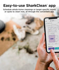 Person using SharkClean app with AI Ultra Robot Vacuum for home mapping, showing room layout and cleaning zones on smartphone.
