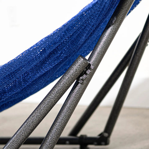 Close-up of navy hammock fabric with collapsible steel stand, part of Heavy Duty Outdoor Hammock With Collapsible Steel Stand And Carrying Case, On The Go And Adjustable, Holds Up To 450 Lb Capacity, Navy Foldable Hammock Set For Camping Beach Patio.