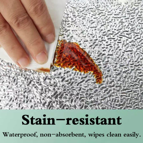 Rugged Heat Resistant Shield Board showing stain-resistant surface being cleaned easily for kitchen safety and efficiency.