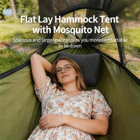Relaxing in 3 In 1 Camping Hammock Tent With Mosquito Net And Rainfly, green fabric, woman lying comfortably outdoors