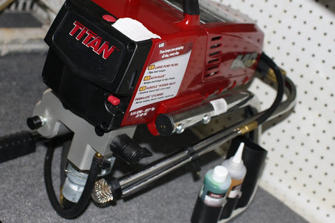 Pro Level Airless Paint Sprayer With Seven Eighth Horsepower Piston Pump Delivers Point Five Four Gallons Per Minute Through Fifty Foot Hose Ready To Tear Through Paint Jobs Without Bull In Sight Built Tough For Weekend Warriors