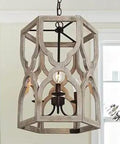 Farmhouse Cozy 3 Light Wood Drum Chandelier With Distressed Taupe Finish And Rustic Iron Accents in dining room setting