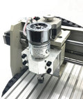 Close-up of Workbench Ready CNC Router Engraver For Home Shop showing aluminum body and spindle mechanism