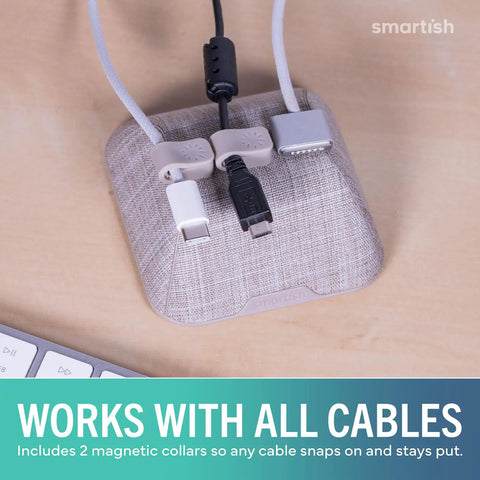 Magnetic Cord Holder Cable Organizer With Magnet Clips For Charger Management On Desktop And Nightstand Keeps USB C And Lightning Cables Tucked And Ready To Roll No Slips Premium Desk Accessory In Light Toasted Beige on desk.