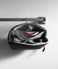 Small Wash Pouch Travel Toiletry Bag Weatherproof With Upright Or Hanging Design on towel rack, mesh pockets visible.