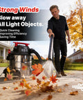 User demonstrating Heavy Duty Eight Gallon Wet And Dry Shop Vacuum With Badass Four Point Five Peak Horsepower Motor clearing leaves.