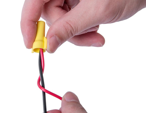 Hands using WireGard Twist On Wire Connector 500 Pack Yellow Color Coded Copper To Copper Wire Connectors Durable And Easy Splices