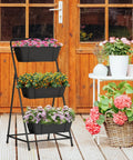 Front view of black Space Saving 3 Tier Raised Garden Bed Vertical Planter With Drainage Holes And Removable Tray on patio