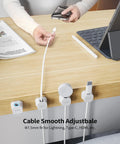 Magnetic Cable Clips Cord Organizer Set For Desk And Office displayed on a desk, securing various cables like USB, Lightning, HDMI.
