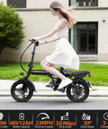 Foldable Electric Bike For Adults And Teens, Hits 23 MPH With Pedal Assist, 38 Mile Range, Powerful 500W Motor, 48V 12Ah Battery, 14 Inch Folding Ebike, 3 Speed Modes, City Commuter Ready black folding ebike on street with rider
