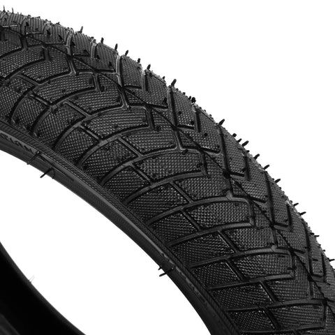 Close-up of tread pattern on Beefed Up 12.5x2.25 Tire And Inner Tube Set For Scooters And Electric Bikes, heavy duty construction.