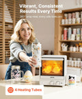 Woman holding a decorated tumbler near 13Quart Sublimation Oven Cranks Out Vivid Transfers Fast With 360 Degree Surround Heat.