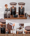 Keep Your Beans Locked Away In This Coffee Canister Set With Two Sealed Glass Jars With One Way Degassing Valves And Dark Blocking Lids Includes Four Dosing Tubes Measuring Spoon Funnel And Sturdy Rack For Your Daily Grind Routine.