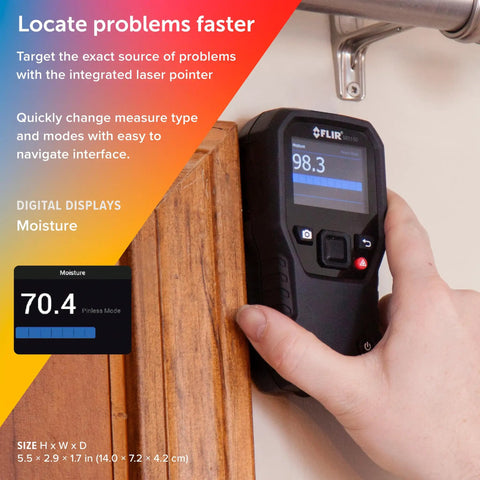 Hand using MR160 Imaging Moisture Meter with IGM Tech on wooden surface, display showing moisture level.