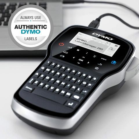 Grab And Go Portable Label Maker With Rechargeable Battery And Qwerty Keyboard on desk with laptop, showing display and keys.