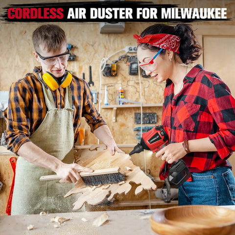 Two people using Cordless Air Blower Dust Duster For Milwaukee 18V, workshop setting, woodwork project cleaning.
