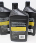 Three bottles of 72751 3 Quarts Commercial Transaxle Transmission Oil for heavy-duty drive systems protection.