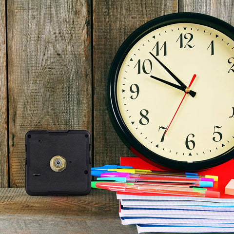 Battery Powered Quartz Clock Movement For Frameless 3D Wall Clocks Replacement Mechanism displayed next to wall clock