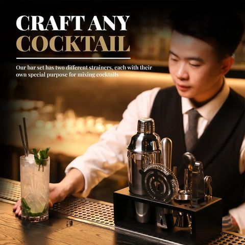 Ultimate Home Bar Mixology Kit With Stand 15 Piece Silver Bar Tool Set cocktail tools on bar with bartender in background.