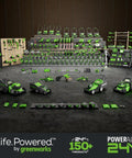 Display of various Greenworks power tools including mowers and chargers with focus on '24V 18-Gauge Brushless Cordless AirStrike Brad Nailer Kit'