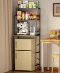 Three Tier Mini Fridge Stand With Heavy Duty Wood And Metal Platforms For Kitchen Dorm Organization with espresso machine and snacks.