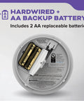 Back view of Hardwired Smoke And Carbon Monoxide Detector Combo With Interconnected Alarm LED Status Lights And AA Battery Backup Dual Detection Tech showing AA battery compartment.