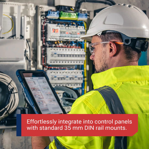 Technician using tablet in front of industrial control panel with IMACP02 Duplex Three Prong Modular Outlet DIN Rail Mount AC Receptacle