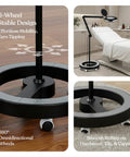 Hands Free Magnifying Floor Lamp With Dimmable LED Light, 5 Diopter Lens, Six Wheel Rolling Stand; images showing smooth rolling base on floor
