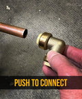 10 Pack Push To Connect Half-Inch 90 Degree Elbow Plumbing Brass Fitting in hand, ready to connect to copper pipe.