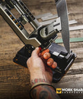 Person using Professional Precision Adjustable Knife Sharpener Kit With Rock Solid Metal Construction For Pocket Hunting Kitchen And Serrated Knives At 15 Degree Angles Includes 7 Diamond Abrasives for sharpening knife.