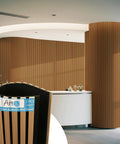 Roll Flexible Acoustic Wood Slat Wall Panels Teak Finish Sound Absorbing Polyester Felt Backing Home Theater Gaming Room Office Decor in modern setting.