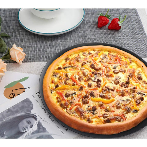 16 Inch Perforated Pizza Pan With Holes For Oven, Heavy Duty Aluminum Round Crisper Baking Tray with baked pizza on top