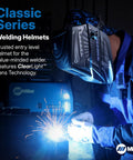 Top Tier Auto Darkening Welding Helmet With Hella ClearLight Hd Optics And Adjustable Shade 8 To 13 Settings For Effortless Metalworking and Heavy Shop Grind worn by a welder with sparks flying.