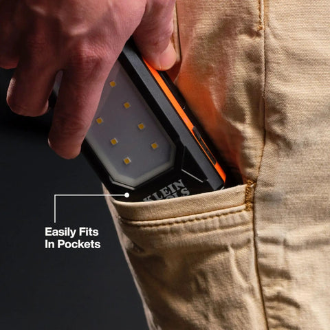 Slim USB C Rechargeable Work Light with 500 Lumens in a pocket, showcasing its compact design for trades and DIY.