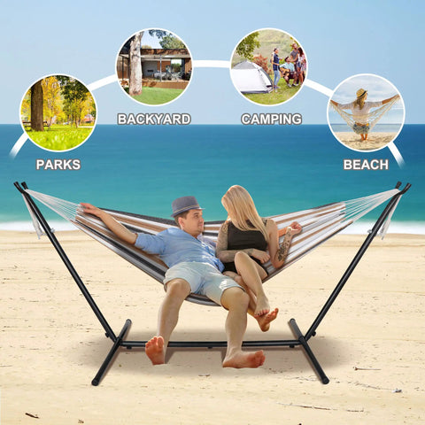 Two Person Portable Hammock With 9 Foot Stand, Heavy Duty 620 Lbs Capacity on beach setting with couple relaxing