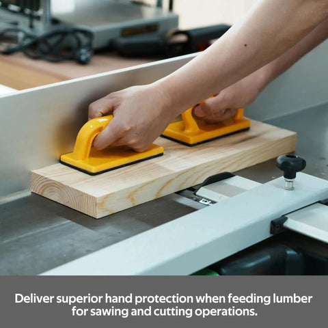 Hands using a Heavy Duty Push Block And Push Stick Set For Table Saws Router Tables Band Saws to safely guide lumber.