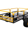 Tow Behind Dump Cart With 1000 Lb Load Capacity And Built-Tough Solid Steel Bed, mesh sides, and all-terrain wheels