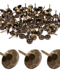 Top Shelf Metal Upholstery Tacks And Furniture Nails For Vintage Diy Makeovers, Rust Resistant Heavy Duty Headpins, 100 Piece Pack Hella Solid Retro Bronze Decorative Hardware, 100 retro bronze upholstery tacks on a white background.