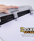 Person using EZ Squeeze Three Hole Punch For 12 Sheets No Jam 50 Percent Less Force Heavy Duty Metal Construction