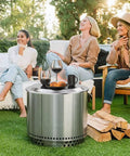 Fire Pit Lid For Solo Stove Bonfire 19.5 Inch Stainless Steel Cover in a backyard setting with wine glasses on top