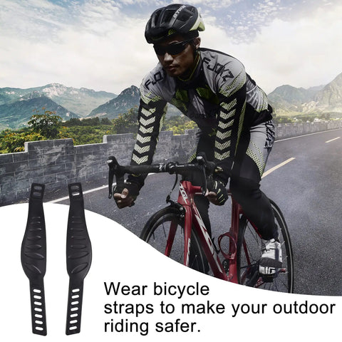Cyclist on road beside Grippy Rubber Pedal Straps 13 By 2.2 Inches Adjustable Universal Straps For Bicycle Cycle Stationary Bike Home Or Gym Use Durable Foot Retention For A Comfortable Ride.