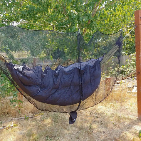 No-See-Um Hammock Mosquito Net XL 11FT By 4.6FT With 360 Degree Bug Protection Polyester Mesh installed on a hammock outdoors