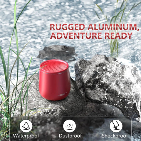 Compact Waterproof Bluetooth Speaker With Big Sound, Portable Mini Wireless Speaker on rocky outdoor setting, red color