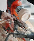 Heavy Duty Woodturning Hollowing Tool With Replaceable Carbide Tipped Round Blade And Solid Beech Handle in use on lathe.