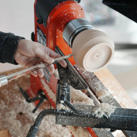 Heavy Duty Woodturning Hollowing Tool With Replaceable Carbide Tipped Round Blade And Solid Beech Handle in use on lathe.
