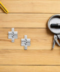 Tiny 43mm Zinc Alloy Concealed Door Hinges 4 Pack For Jewelry Boxes And Small Cabinets, displayed on wooden surface.