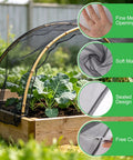 Sturdy Black Patio Mosquito Netting 9.8Ft By 18Ft Garden Mesh on raised garden bed showing fine mesh openings and soft material.