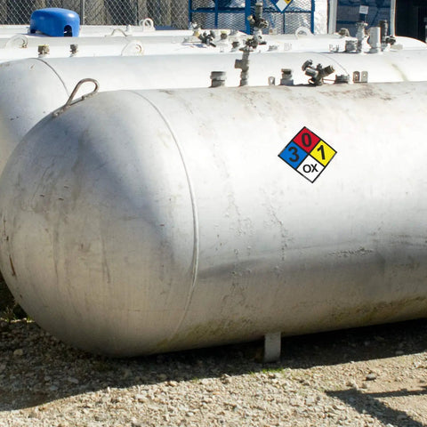 Large tank displaying NFPA Adhesive Label Kit With Placards Digits And Symbols Seventeen Inch Tall Diamond Laminated Vinyl For Field Signs