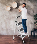 350 Lb Capacity 3 Step Folding Ladder With Non Slip Feet And Offset Legs Anti Slip Wide Steps And Handgrip ANSI Certified Lightweight Aluminum Stepping Stool For Kitchen Home Office And Garage, man on ladder