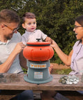 Family using 18 Lbs Vibratory Tumbler Polishing Machine For Metal Parts With Walnut Shell Media Super Easy To Use Rust Removal Smooth Finish Durable 120V 60Hz Bench Top Buffing And Deburring Tool For Small Shops And DIY on table outdoors.